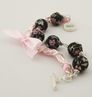 Black floral cotton beads and rose satin ribbon bracelet