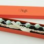 Light green floral cotton beads and beige satin ribbon bracelet