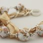 White floral cotton beads and eggshell satin ribbon bracelet