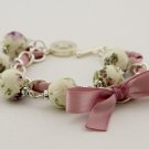 Floral cotton beads and orchid satin ribbon bracelet