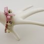 Floral cotton beads and orchid satin ribbon bracelet