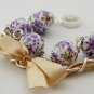 Purple cotton beads and yellow satin ribbon bracelet