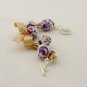 Purple cotton beads and yellow satin ribbon bracelet