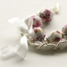 Red flowers cotton beads and white satin ribbon bracelet