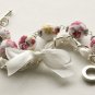 Red flowers cotton beads and white satin ribbon bracelet
