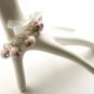 Red flowers cotton beads and white satin ribbon bracelet