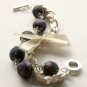Black floral cotton beads and beige satin ribbon bracelet
