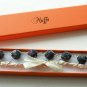Black floral cotton beads and beige satin ribbon bracelet