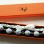 Blue cotton beads and white satin ribbon bracelet