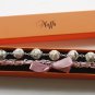 Cream fabric beads and lilac satin ribbon bracelet