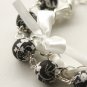Black fabric beads and white satin ribbon bracelet