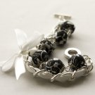 Black fabric beads and white satin ribbon bracelet