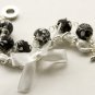 Black fabric beads and white satin ribbon bracelet