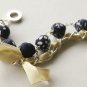 Dark blue fabric beads and yellow satin ribbon bracelet