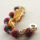 Red cotton beads and yellow satin ribbon bracelet