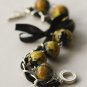 Black Satin Ribbon and Yellow Roses Beads Bracelet