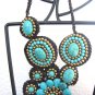 beach waxed wicker necklace made with brown-torquise/blue and gold stones