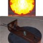 7" round Amber 12 Volt light with mounting bracket