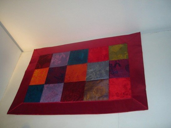 Patchwork placemat in red