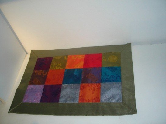 Patchwork placemat in green