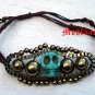 Skull Bracelet Carved Stone Brown Cord Adjustable Antique Gold Turquoise Day of the Dead
