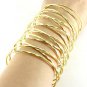 Wire Coil Wrap Armor Cuff Bracelet Designer Style Gold Abstract Avant Garde Statement