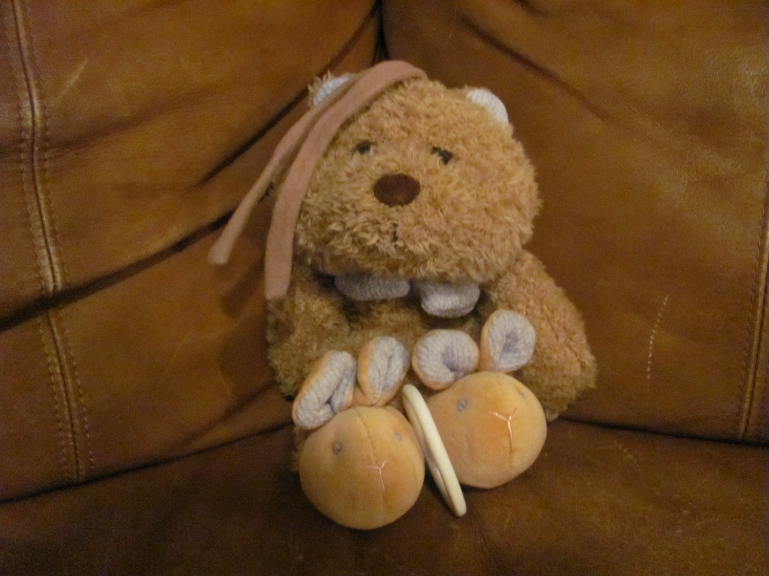 teddy bear with bunny slippers