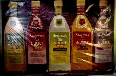 NEAT COLORFUL SEAGRAMS FLAVORED GINS BOTTLES TIN SIGN
