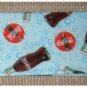 Checkbook Cover: Coca Cola Theme: Coke Bottles on Blue