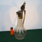 An Antique Silver plated Burgundy Carafe.
