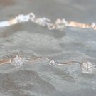 STERLING SILVER CUBIC ZERCONIA FLOWER LINK BRACELET