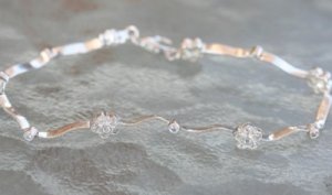 STERLING SILVER CUBIC ZERCONIA FLOWER LINK BRACELET