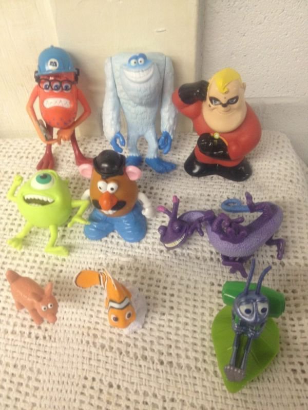 Игрушка пиксар. Пиксар игрушки. Disney Pixar Nemo finding игрушка. Приключения Флика игрушки. Фигурки Disney Pixar Корпорация монстров.