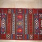 Multicolor geometric chain stitch embroidered rug