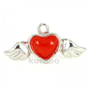 Flying heart charm