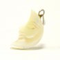 Half moon charm in shell