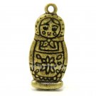 Russian nesting doll charm in bronze