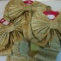Three Big Long Gold Christmas Holiday Bows