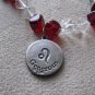 Red and Clear Leo Necklace