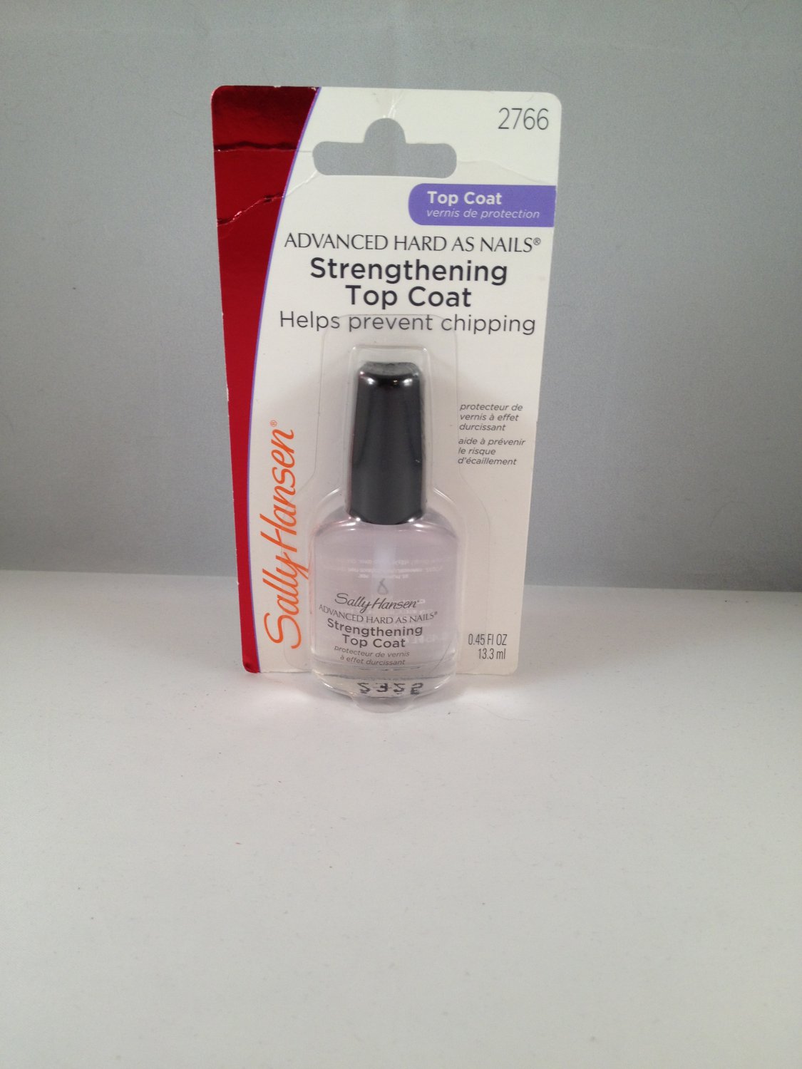 Sally Hansen Advanced Hard As Nails Strengthening Top Coat clear nail ...