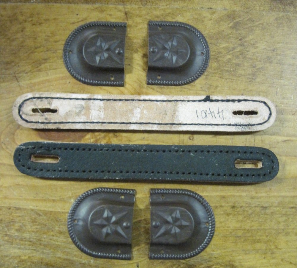 2 leather trunk handles and ends