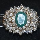 3.94 carat emerald ring surrounded by diamond
