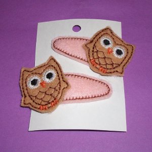 Pair of owl clippies