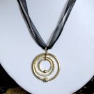 Gold circles pendant from organza cord - fashion necklace