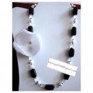 Semiprecious onyx and f.w. cultured pearl necklace with organza flower