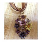 Flowers and butterfly pendant on organza cord necklace