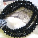 Triple row faceted crystals with black accent slip on bracelet
