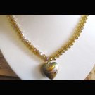 Gold fashion necklace with heart bird pendant