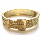 Elegant hinged goldtone bracelet with crystals -
