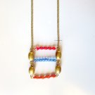 Red blue orange and gold trendy fashion necklace by Lucine {2686N}